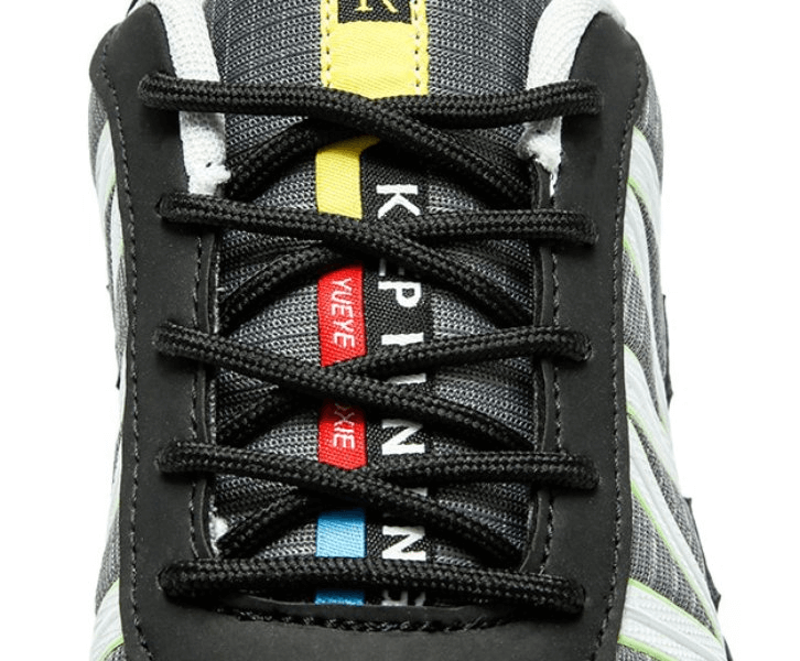 Close-up of waterproof non-slip men's sneaker with colorful eyelets and geometric lace-up on a breathable mesh upper, model SF0780.